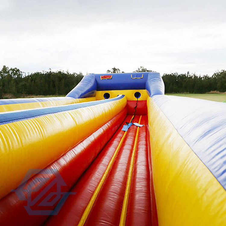 Juego deportivo inflable Twister 2 Lane Bungee Run, desafío inflable